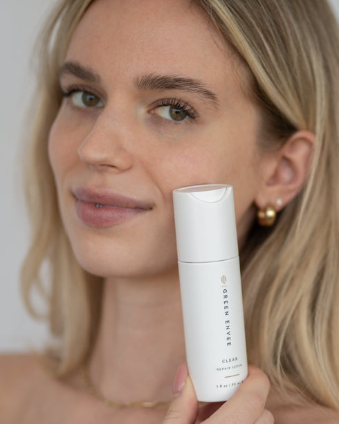 person holding CLEAR REPAIR SERUM 30ML